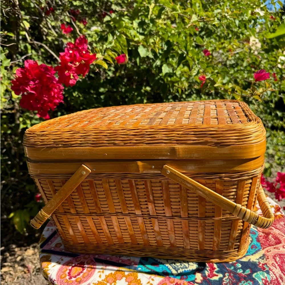 Large Vintage Handmade tan rattan picnic basket with handles.